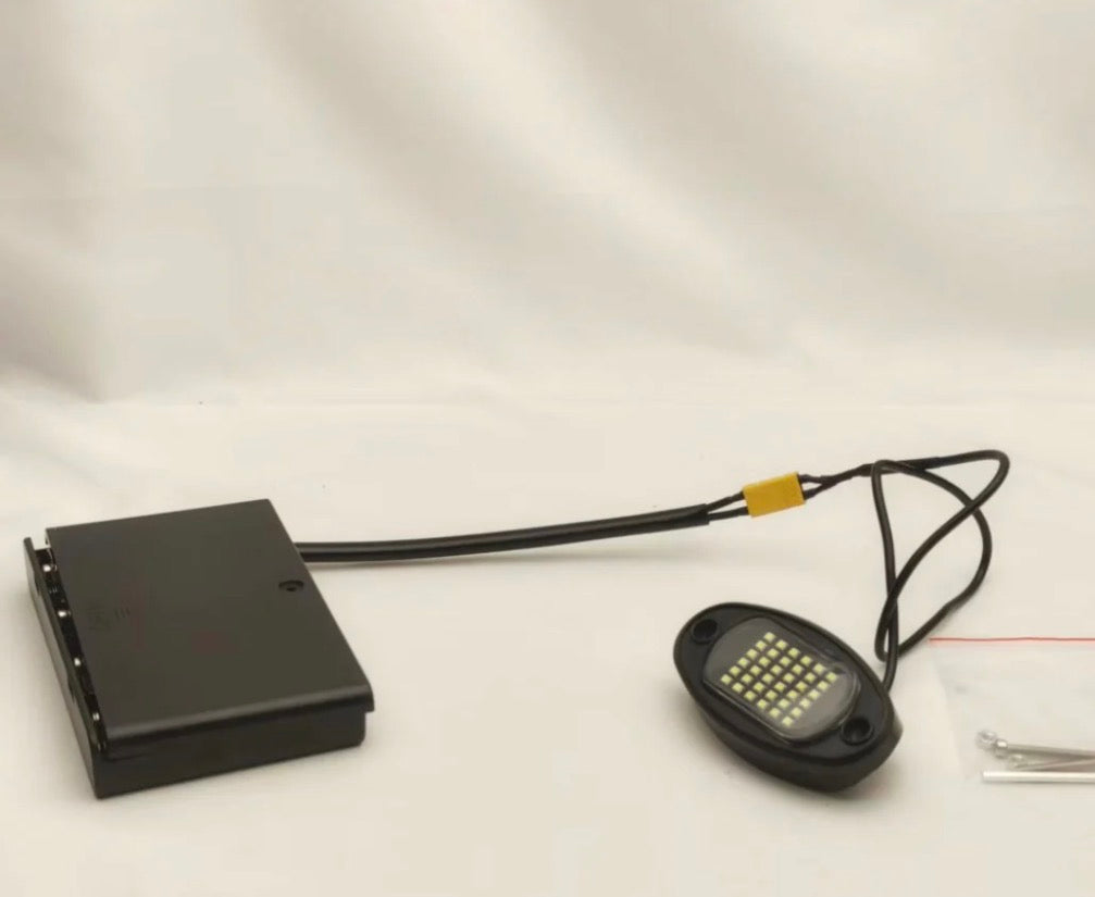 Battery powered rock light